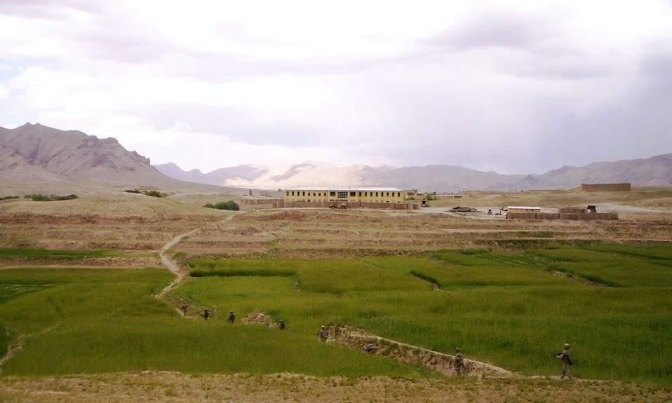 Open terrain and mountains near a service route